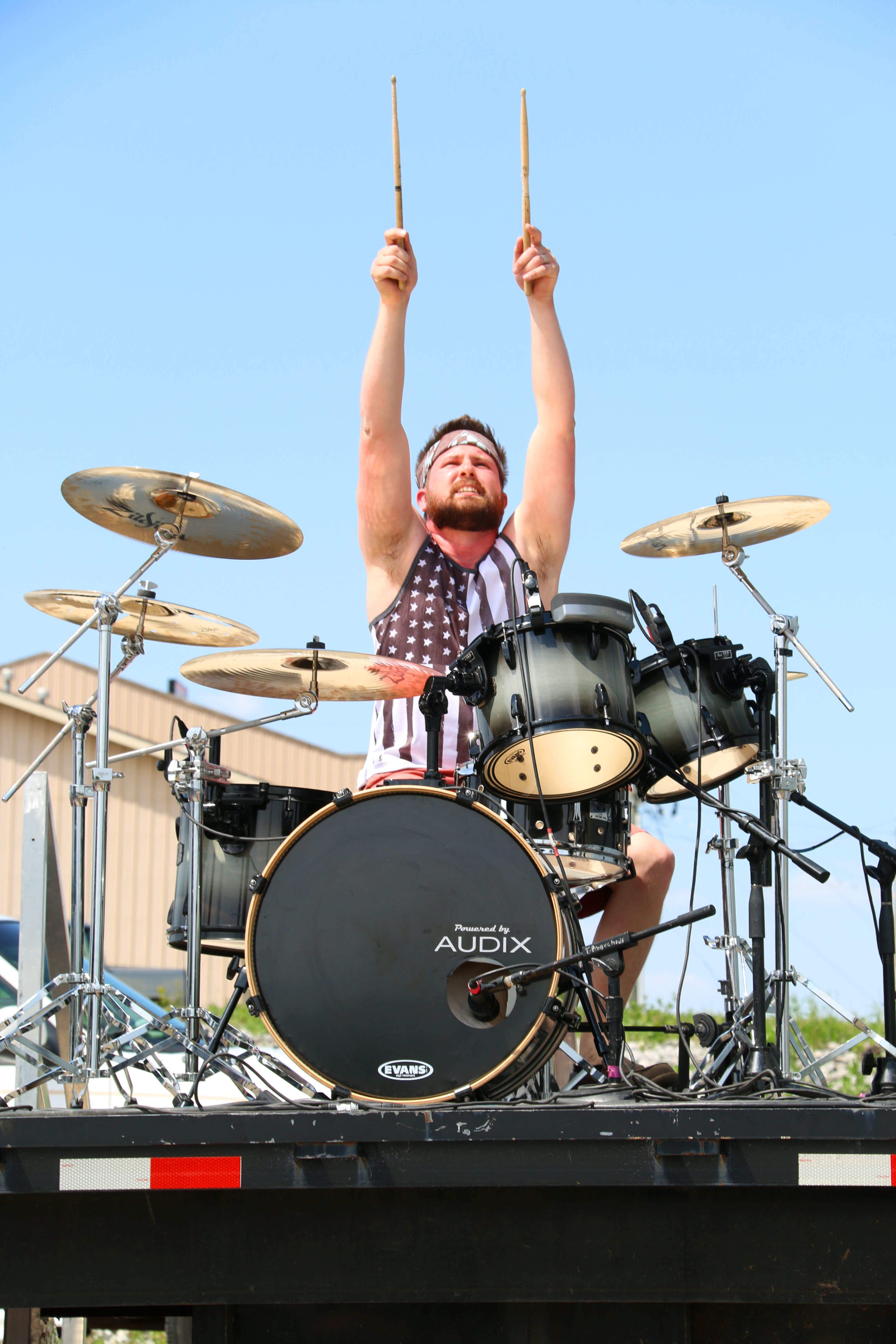 Anthony Decker, the drummer for Three Ciities, playing at Brandt's I-69 Harley Davidson in Marion, IN